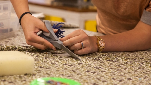 Art_Costume_12 Student cutting fabric.