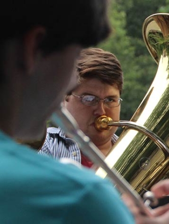 temp_summer_brass Someone playing brass at Washington Square park